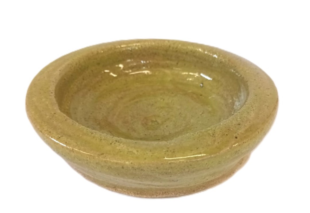 Shallow green ceramic bowl
